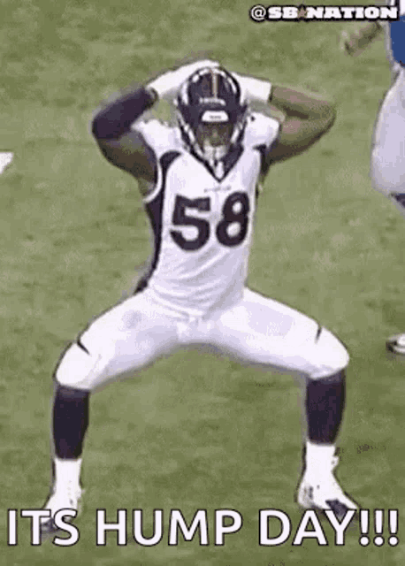 a football player with the number 58 on his jersey is standing on one leg on a field .