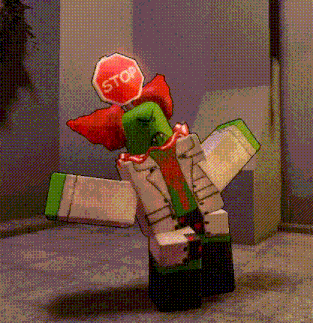 a clown with a stop sign on his head is standing on the floor .