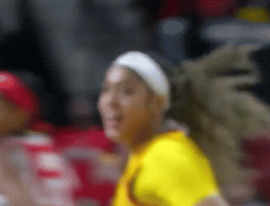 a blurry picture of a woman in a yellow shirt