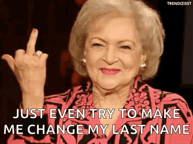 a woman is giving the middle finger and saying `` just even try to make me change my last name '' .