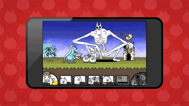 a phone screen shows a game with a giant skeleton in it