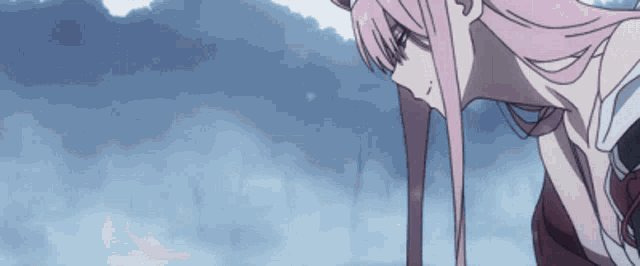 a girl with long pink hair is looking down at something