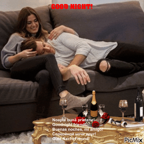 a picture of a man and woman laying on a couch with a good night message