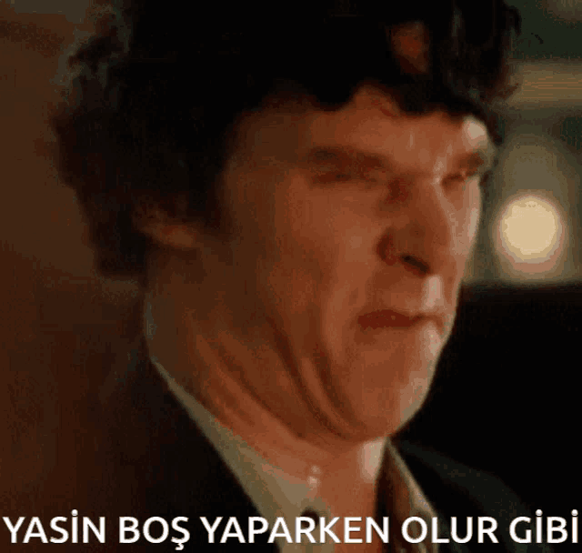 a close up of a man 's face with the words yasin bos yaparken olur gibi written below him