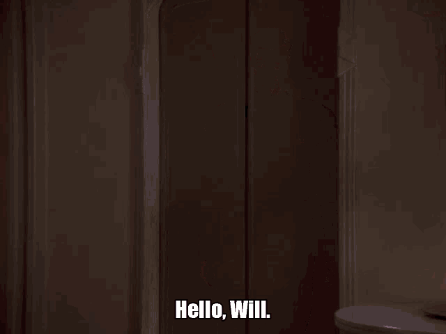 a man in a red uniform is standing in a doorway and says hello will