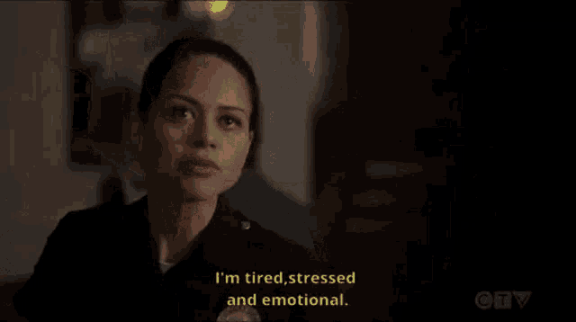 a woman in a police uniform is talking to someone and saying `` i 'm tired , stressed and emotional ''