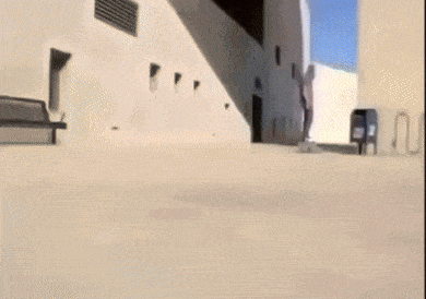 a person wearing a helmet is laying on the ground .