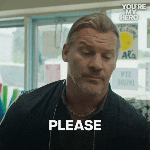 a man in a black jacket says please in front of a window