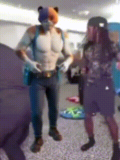 a blurry picture of two people in costumes