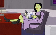 a woman is sitting in a chair reading a book