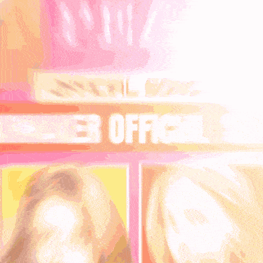 a blurred image of a sign that says ' what ' on it