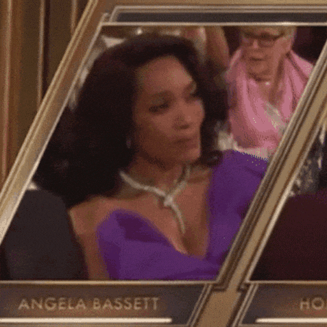 a woman in a purple dress is in a picture frame with the name angela bassett on it