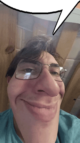 a man with glasses and a speech bubble behind him