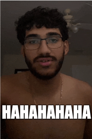 a shirtless man with glasses and a beard says ' hahahaha ' in front of his face