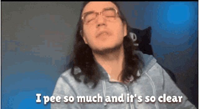 a man with long hair says i pee so much and it 's so clear