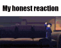 a man is sitting on a couch with his hands in the air and the words `` my honest reaction '' above him .
