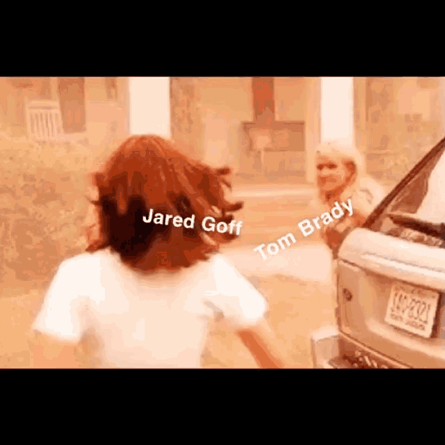 a girl is running towards a car with the words jared goff and tom brady on it