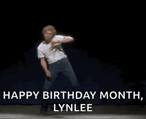 a man is dancing on a stage with the words `` happy birthday month , lynlee '' written above him .