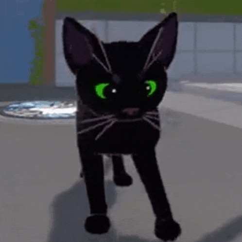 a black cat with green eyes is standing on the sidewalk .