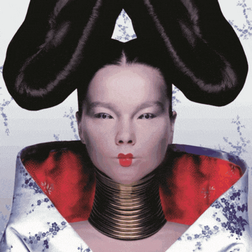 a woman with a very long neck wearing a kimono