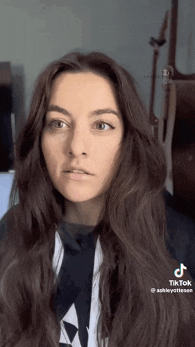 a woman 's face is shown in a tiktok video ..