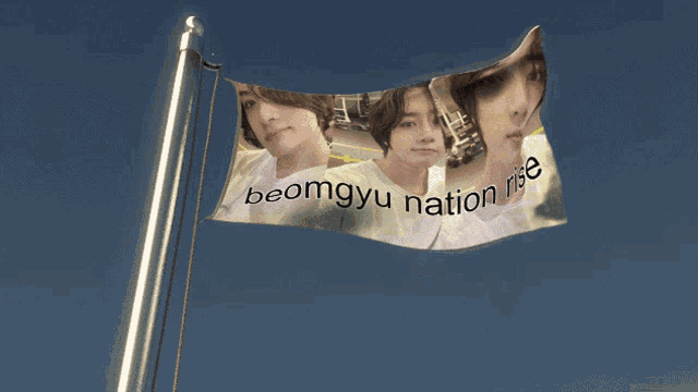 a flag that says beomgyu nation rise is hanging from a pole