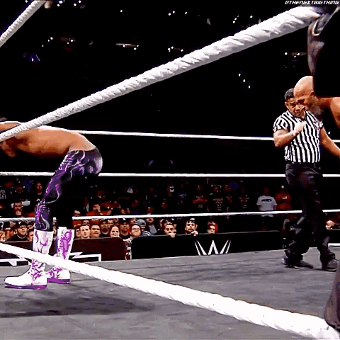 a wrestling ring with a referee and a hashtag that says thenextbig thing