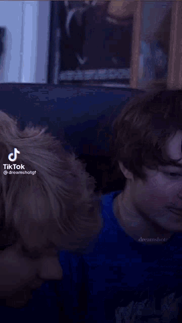 a tik tok video of a couple of boys