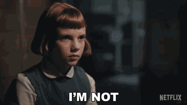 a girl with red hair says " i 'm not " in front of a netflix logo
