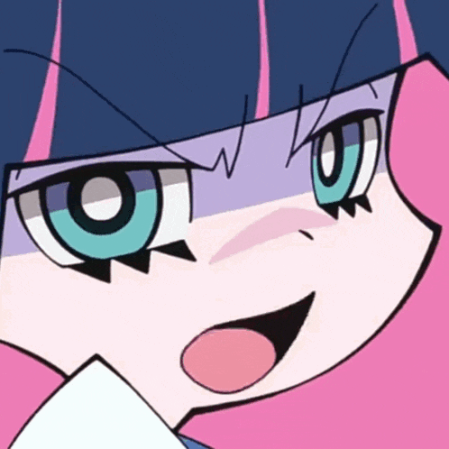 a close up of a cartoon character 's face with big blue eyes