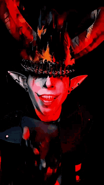 a painting of a devil with horns and a crown