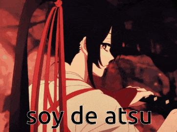 a girl with red ribbons in her hair and the words soy de atsu