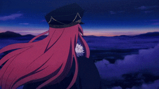 a woman with long red hair is wearing a hat