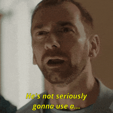 a man with a beard and earrings says he 's not seriously gonna use a