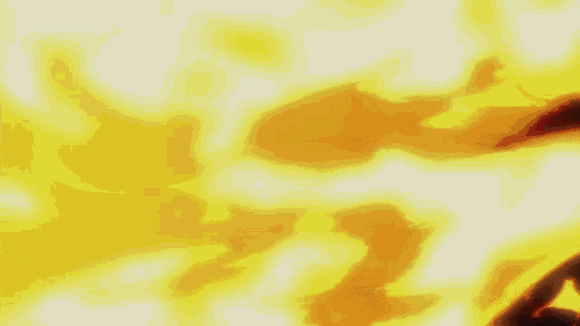 a bunch of flames are coming out of a dark background