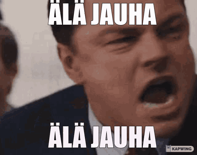 a man in a suit and tie is making a funny face with the words " ala jauha " written on it