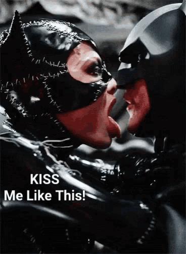 a picture of batman and catwoman kissing with the words kiss me like this at the bottom