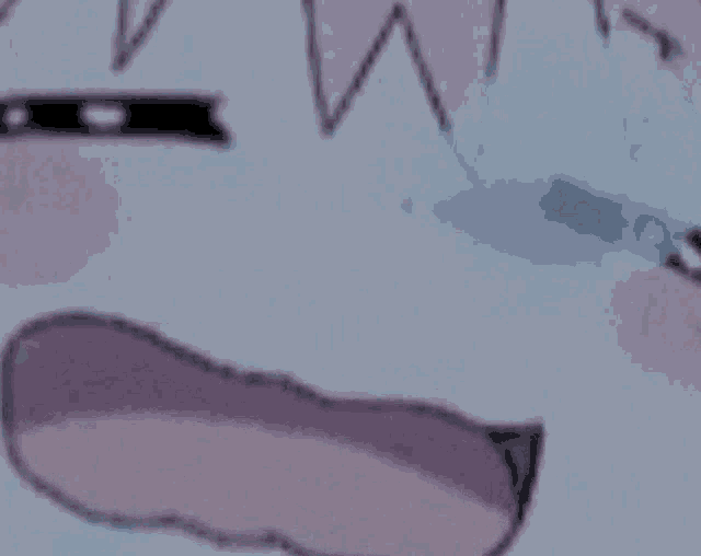 a close up of a person 's face with a pink tongue sticking out .
