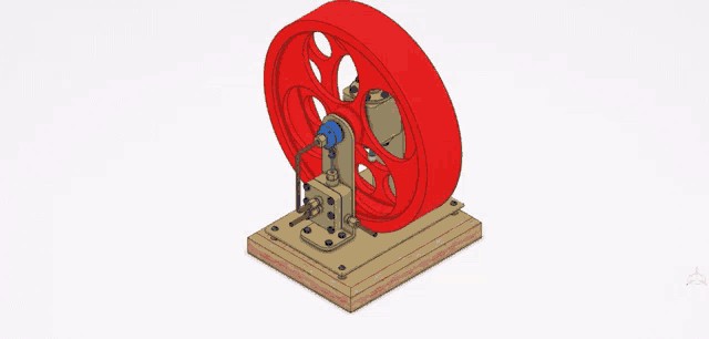 a red wheel is on a wooden base