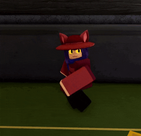 a cartoon character wearing a red hat and a purple scarf