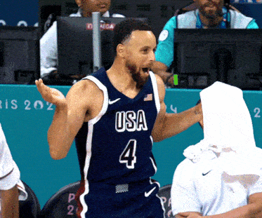 a basketball player wearing a usa jersey with the number 4