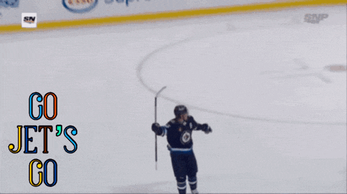 a hockey player with the number 55 on his shirt