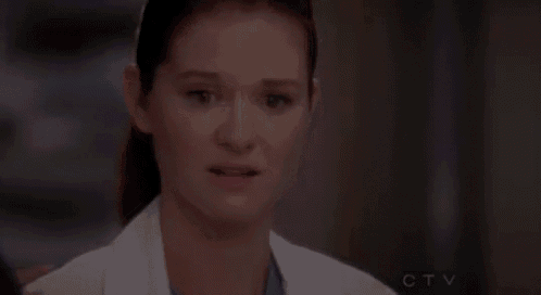 a close up of a woman in a lab coat with the letters ctv on the bottom