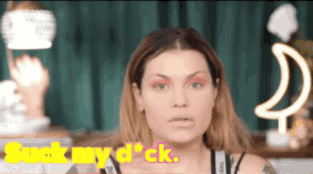 a woman says " fuck my dick " in front of a crescent moon