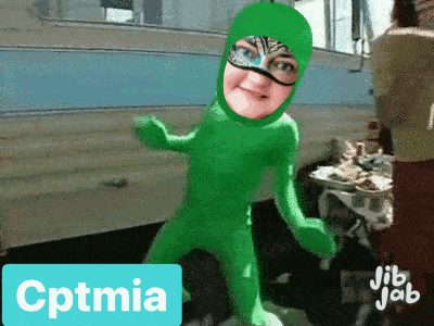 a girl in a green superhero costume with the name cptmia below her