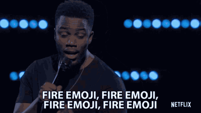 a man is speaking into a microphone and says fire emoji fire emoji fire emoji fire emoji