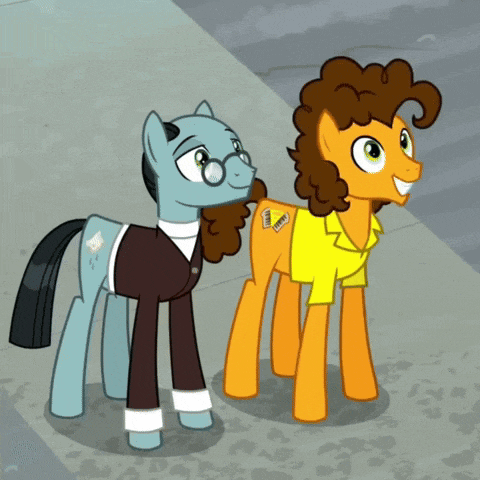 a couple of ponies standing next to each other with one wearing a yellow shirt that says i love you on it