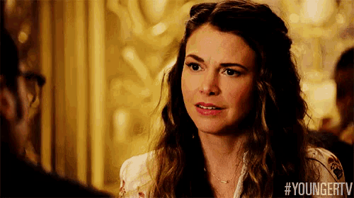 a close up of a woman 's face with the hashtag #youngertv on the bottom