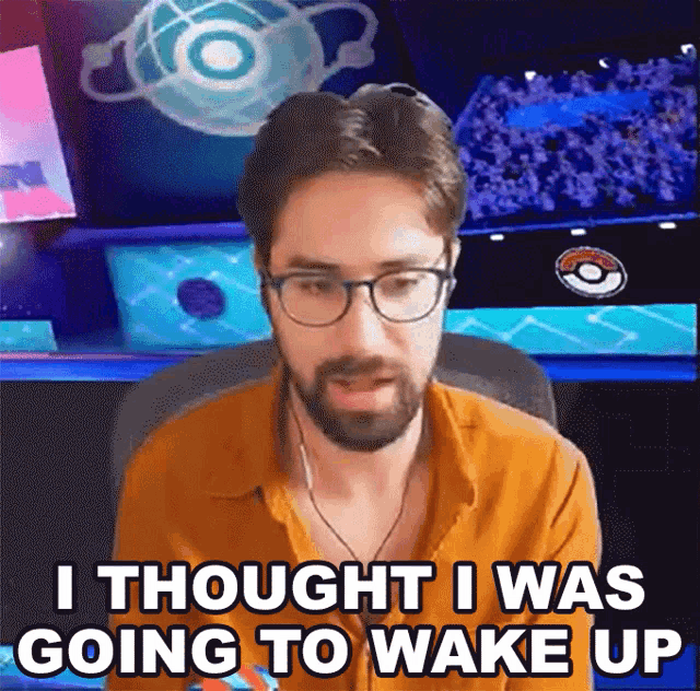 a man wearing glasses and headphones says i thought i was going to wake up