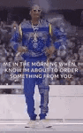 snoop dogg is dancing in front of a crowd while wearing sunglasses .